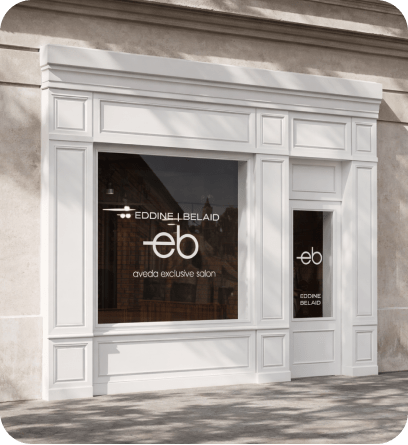 Eddine Belaid Barber Shop window with modern branding