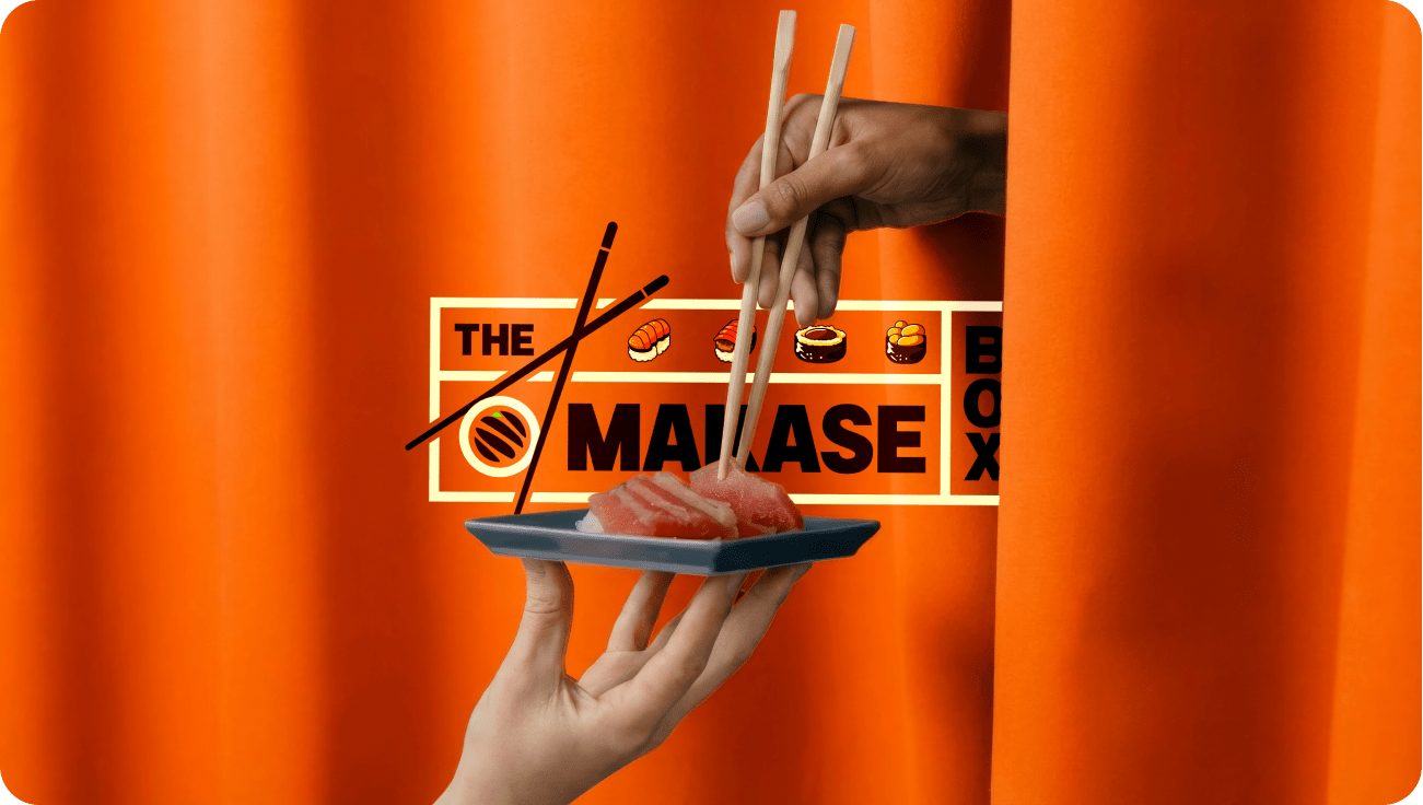 Hand holding sushi with chopsticks beside The Omakase Box bold orange branding