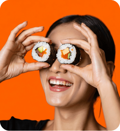 Playful sushi lifestyle shot capturing Omakase Box's adventurous culinary experience