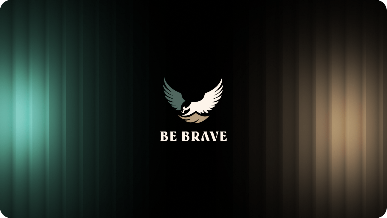 Be Brave eagle logo with gold wings on dark dramatic background